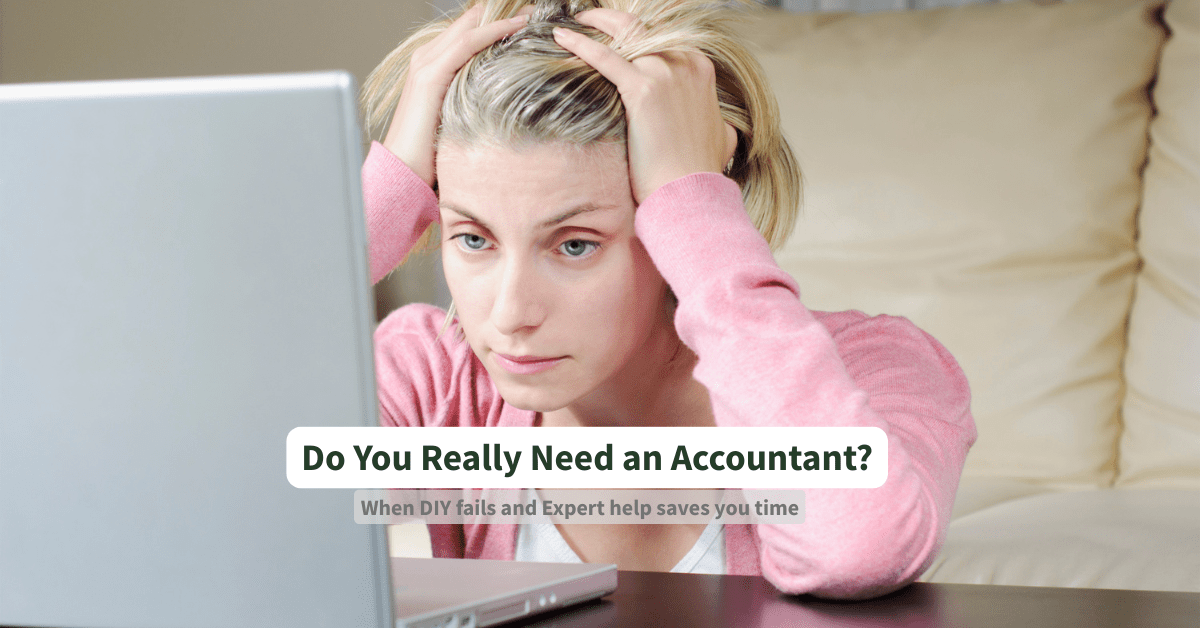 Small business owner looking overwhelmed, questioning whether to hire an accountant.